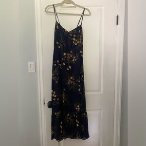 Reformation spaghetti strap navy dress with print. In beautiful condition!